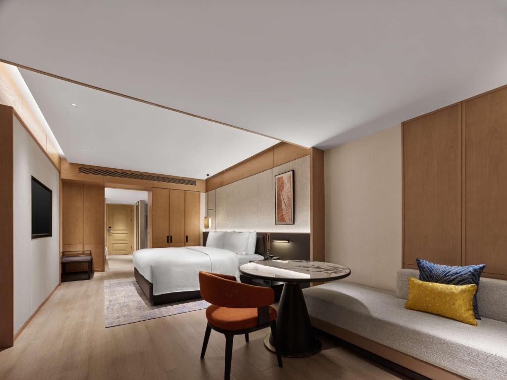 Postel nebo postele na pokoji v ubytování DoubleTree by Hilton Weihai