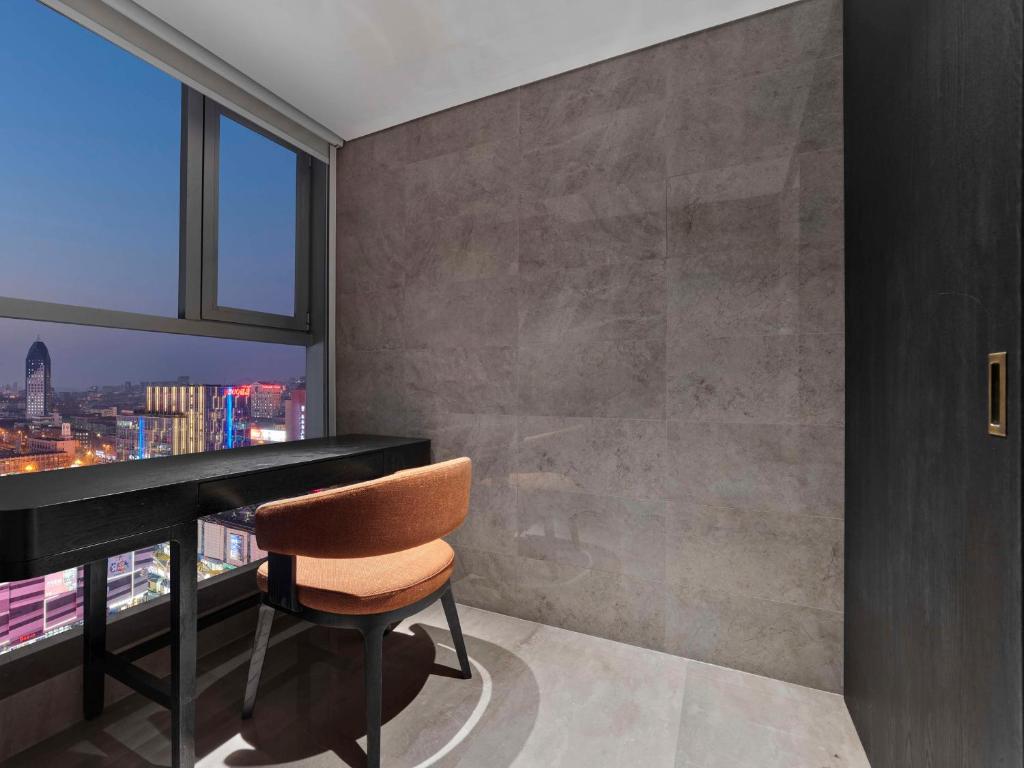 TV a/nebo společenská místnost v ubytování DoubleTree by Hilton Weihai
