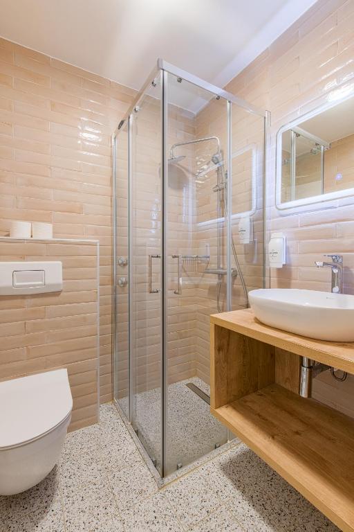 Koupelna v ubytování Hotel Delfin