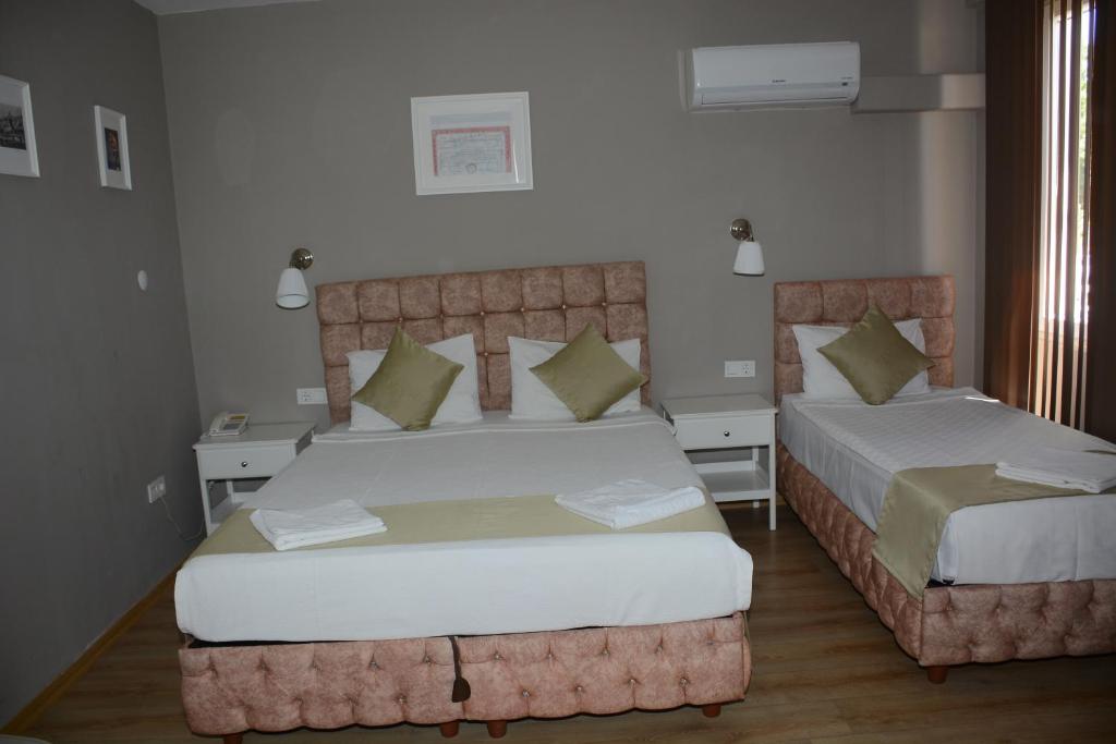 Postel nebo postele na pokoji v ubytování Hotel Dream Of Side