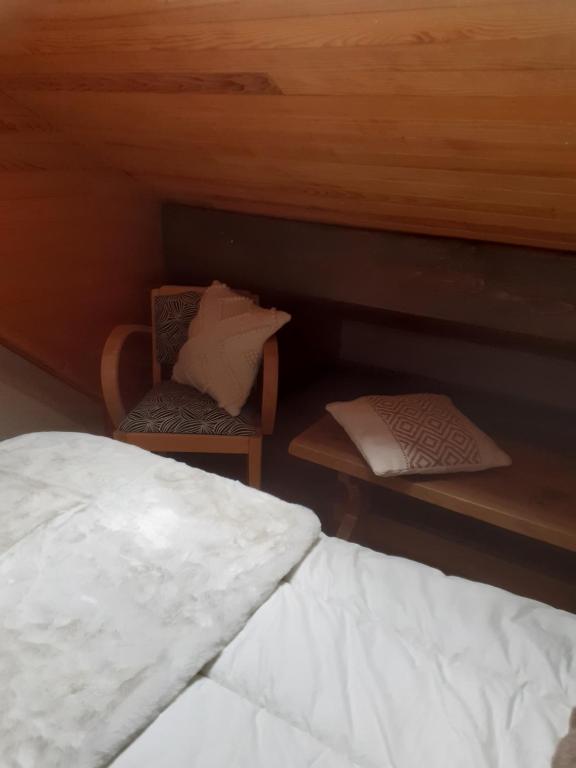Postel nebo postele na pokoji v ubytování Hameau des Granges