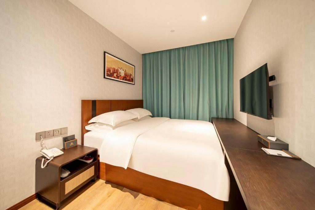 Postel nebo postele na pokoji v ubytování Pami hotel