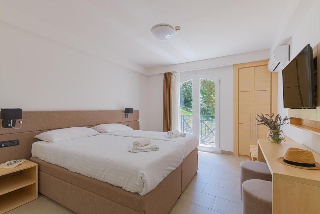 TV a/nebo společenská místnost v ubytování Hotel Delfin