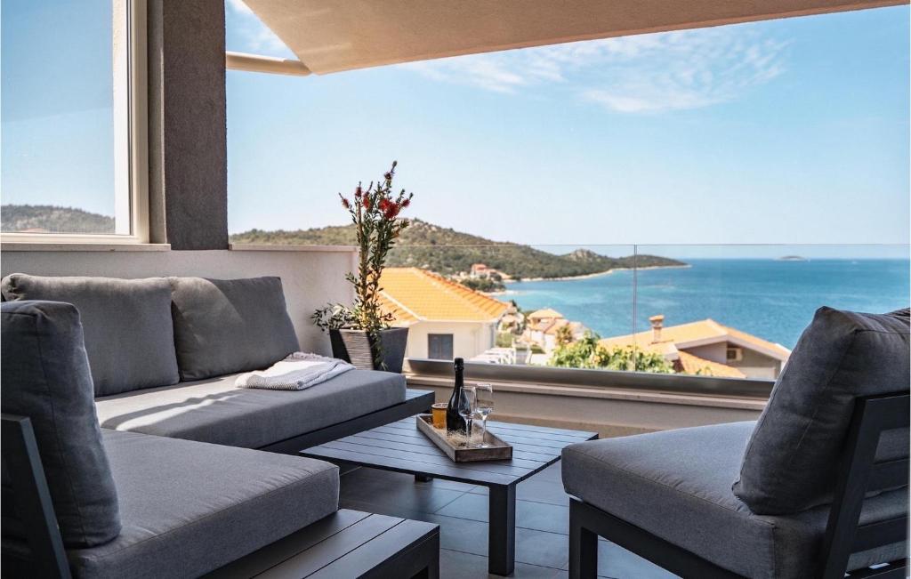 a living room with a view of the ocean at Villa Miracle in Split