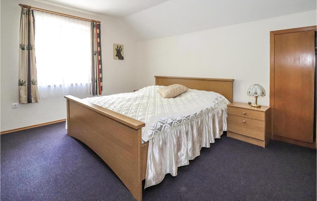 Posteľ alebo postele v izbe v ubytovaní Gemuetliche Ferienwohnung
