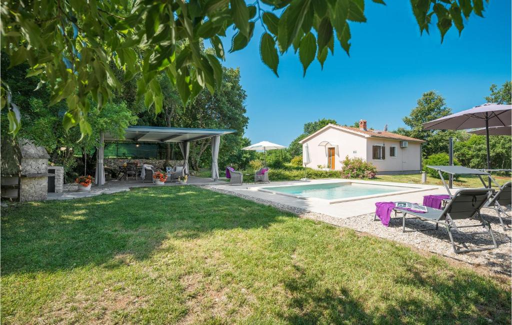 Zahrada ubytování Two-Bedroom Holiday Home In Bale