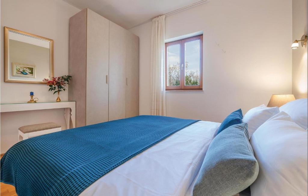 Postel nebo postele na pokoji v ubytování Two-Bedroom Holiday Home In Bale