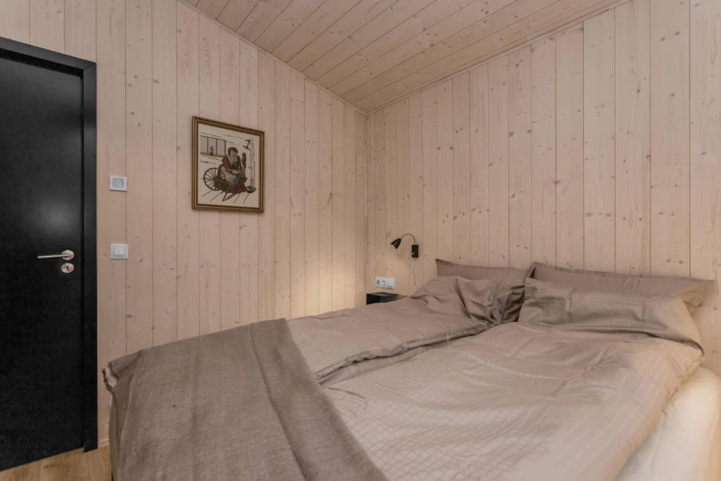 Postel nebo postele na pokoji v ubytování Cozy and Modern Cabins in Selfoss