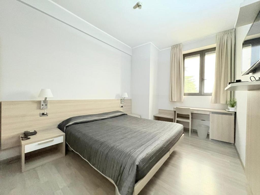 Posteľ alebo postele v izbe v ubytovaní Hotel Meuble' Atlantic