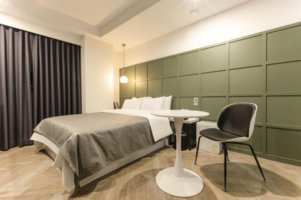 Postel nebo postele na pokoji v ubytování Arentz Hotel