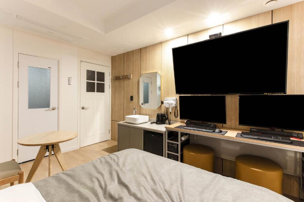 Kuchyň nebo kuchyňský kout v ubytování Arentz Hotel