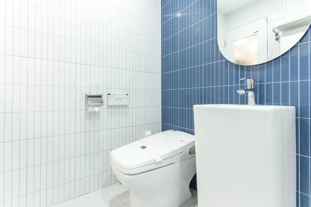 Koupelna v ubytování Arentz Hotel