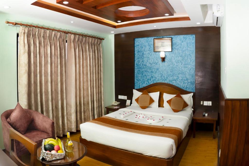 Postel nebo postele na pokoji v ubytování Samsara Boutique Hotel