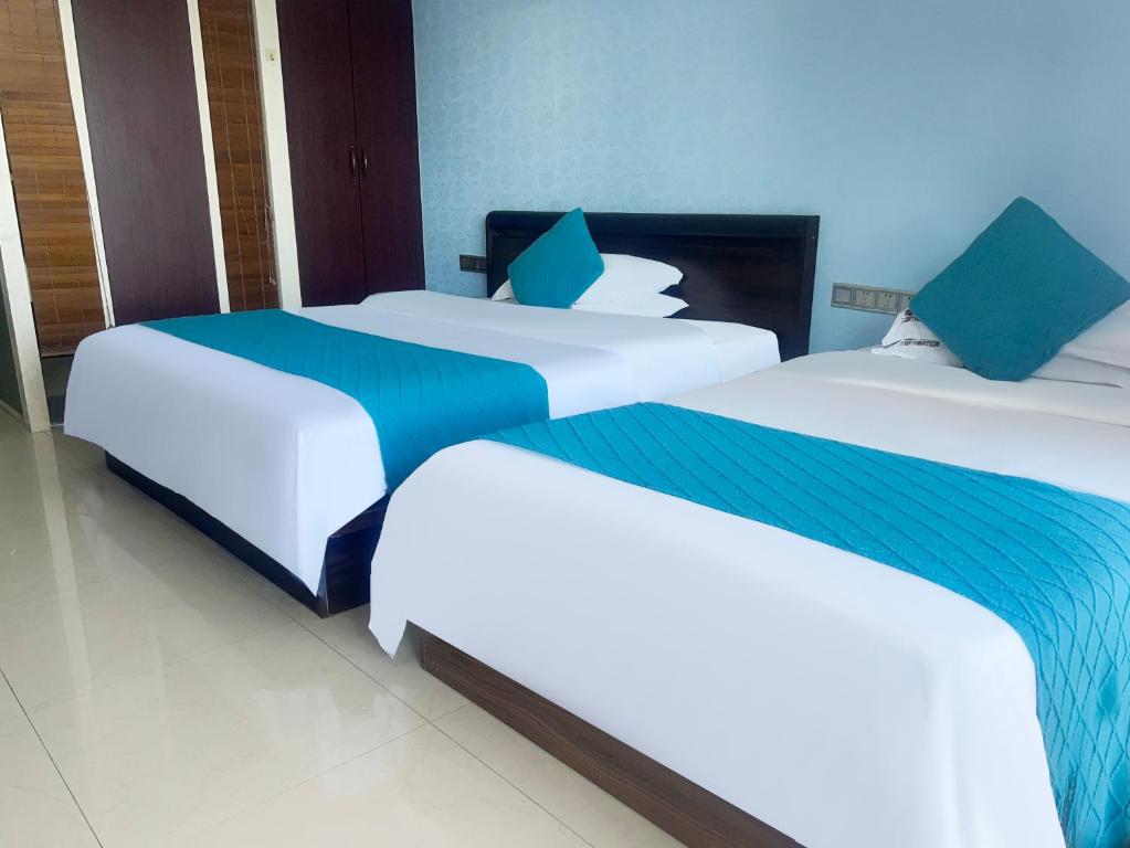 Sanya Sun and Sea Gueshouse - 带有海景的双室