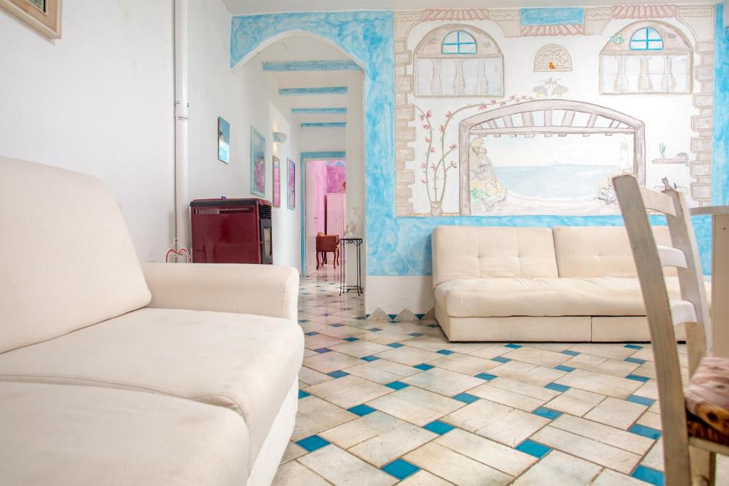 Posezení v ubytování Locanda Domus De Vida