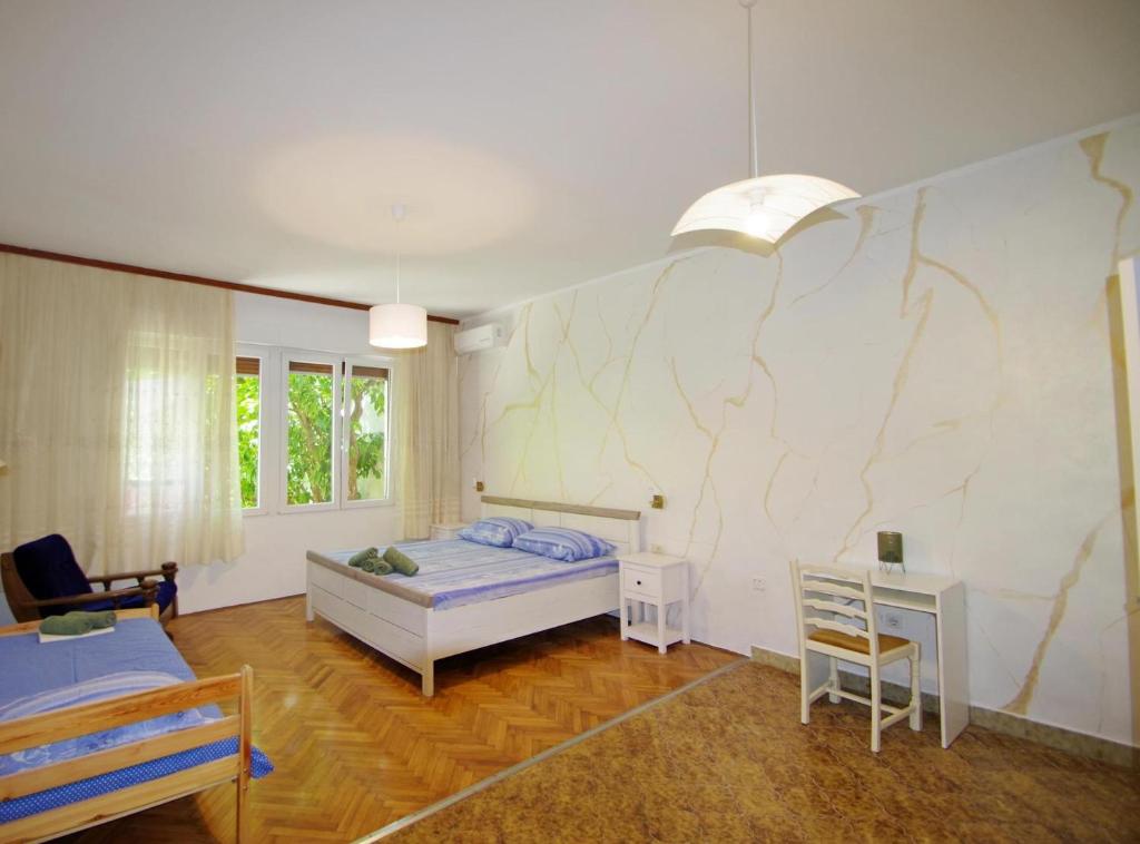 Postel nebo postele na pokoji v ubytování Apartman Gortanova uvala