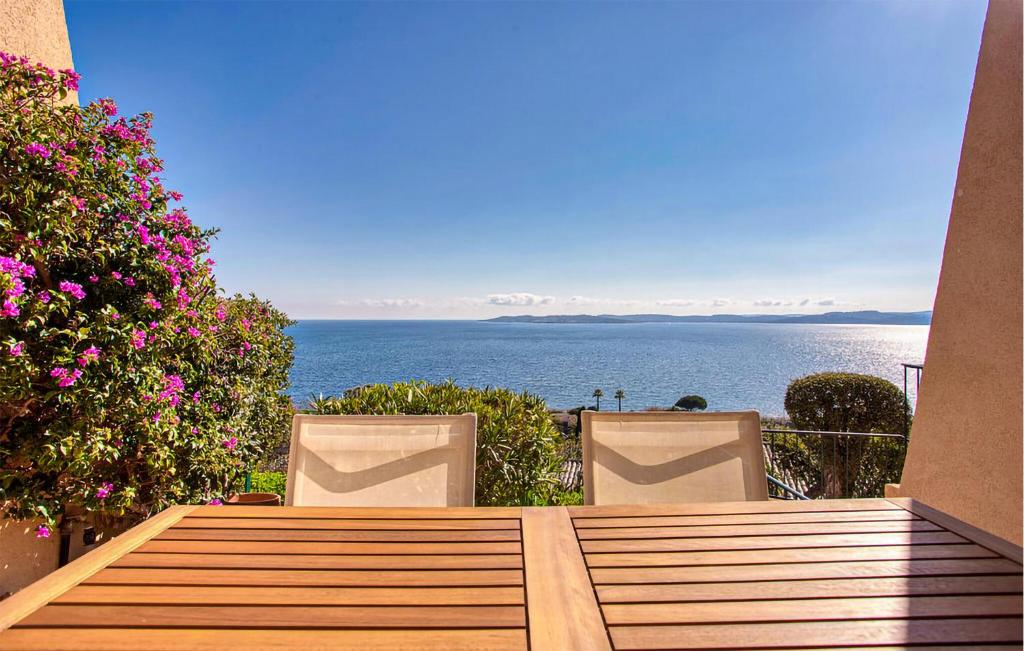a view of the ocean from a balcony at 3 Bedroom Amazing Home In Sainte Maxime in La Nartelle