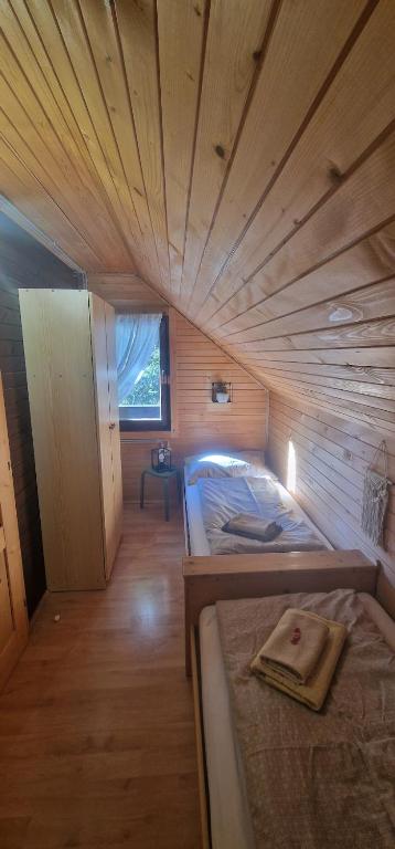 Postel nebo postele na pokoji v ubytování Forest Apartments Pokljuka