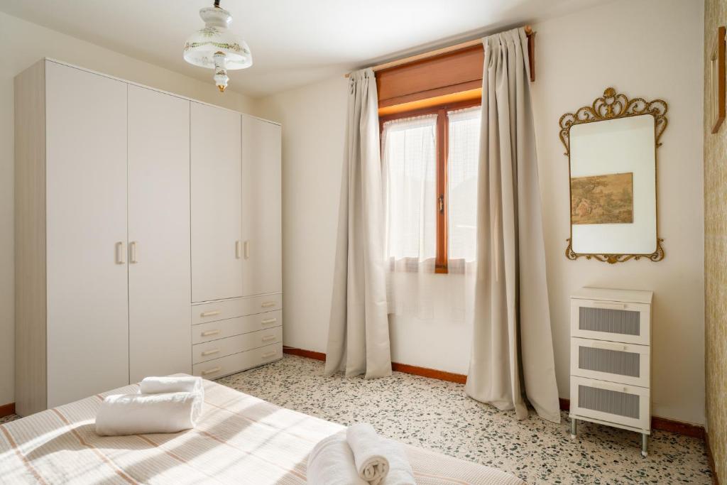 Postel nebo postele na pokoji v ubytování Bellavista - Residence in Barzio center near free ski shuttle