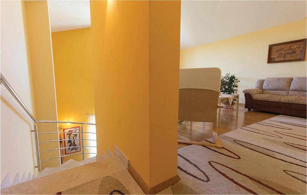 Łóżko lub łóżka w pokoju w obiekcie Holiday Home Volme