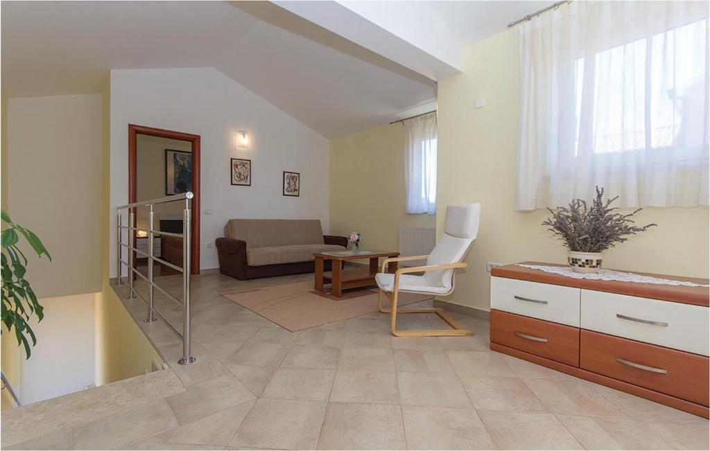 Łóżko lub łóżka w pokoju w obiekcie Holiday Home Volme