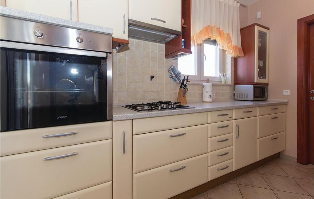 Kuchnia lub aneks kuchenny w obiekcie Holiday Home Volme