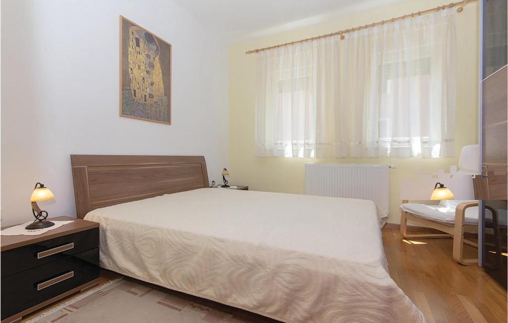 Łóżko lub łóżka w pokoju w obiekcie Holiday Home Volme