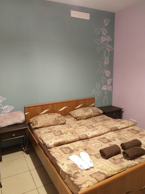Postel nebo postele na pokoji v ubytování Sherlock Hotel