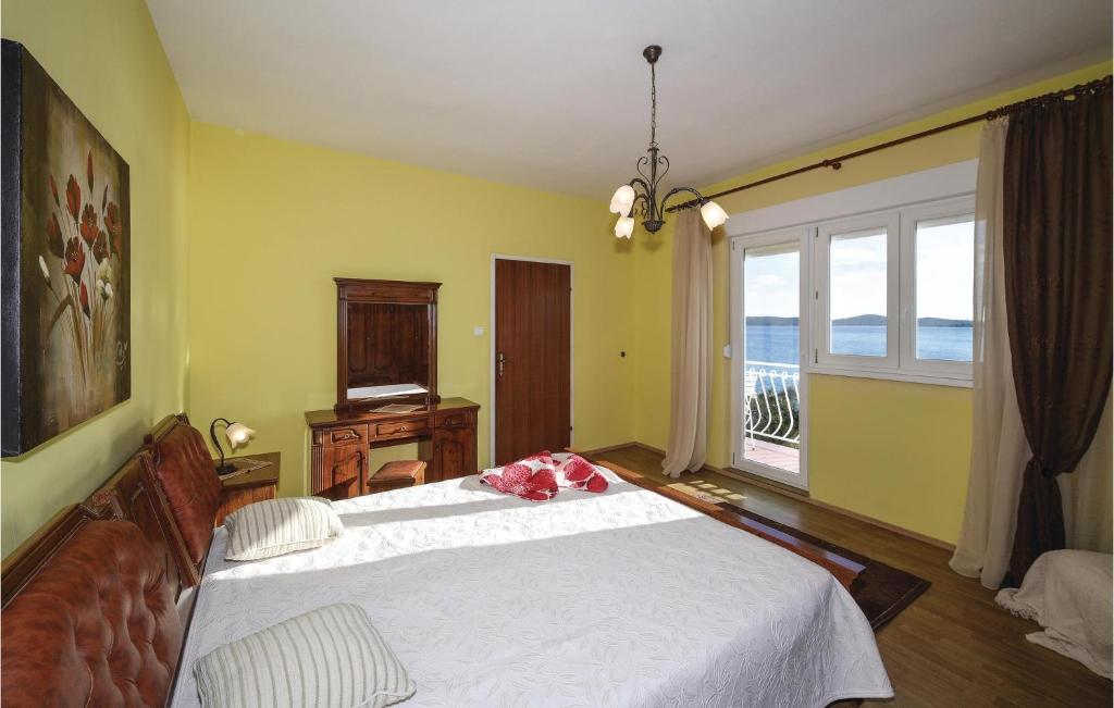 Posteľ alebo postele v izbe v ubytovaní Apartment Obala Spanja Roka Cr