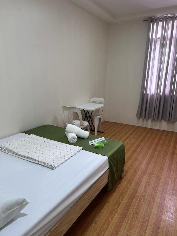 Postel nebo postele na pokoji v ubytování Baden Powell Hostel