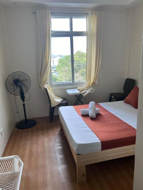 Postel nebo postele na pokoji v ubytování Baden Powell Hostel