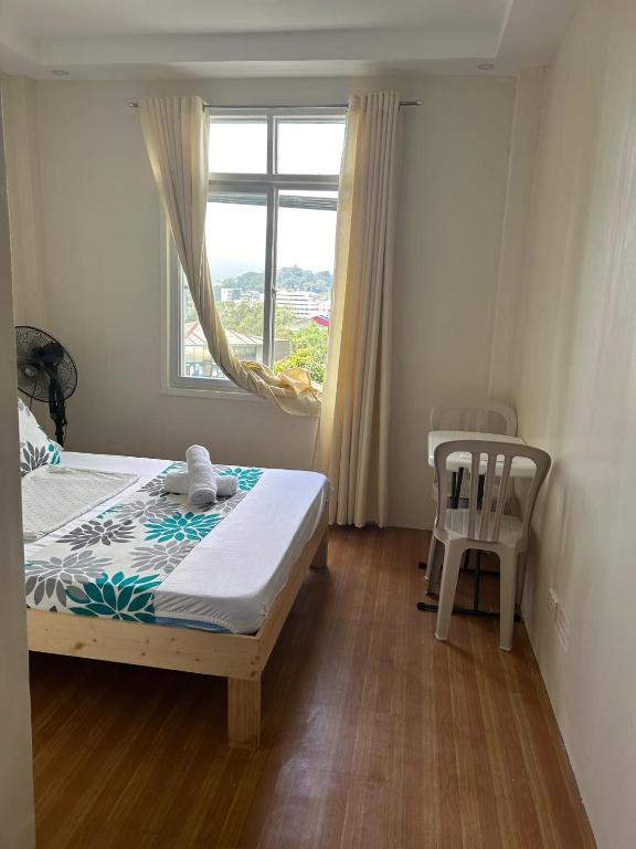 Postel nebo postele na pokoji v ubytování Baden Powell Hostel