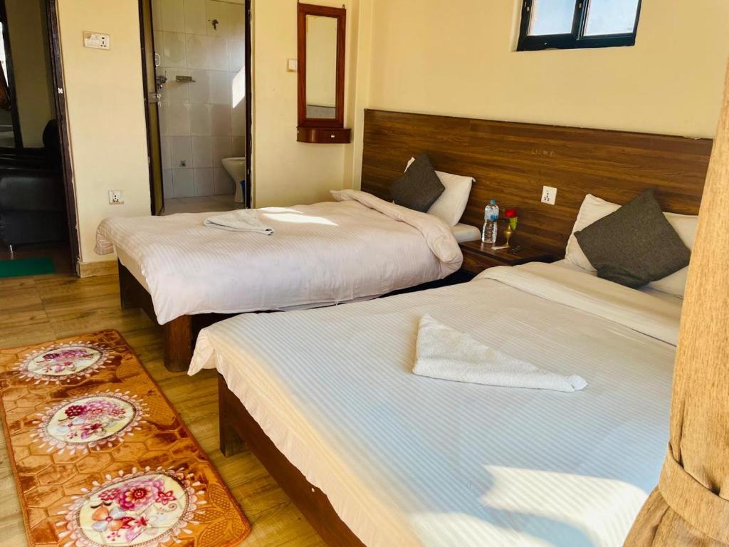 Postel nebo postele na pokoji v ubytování Hotel Lake Journey