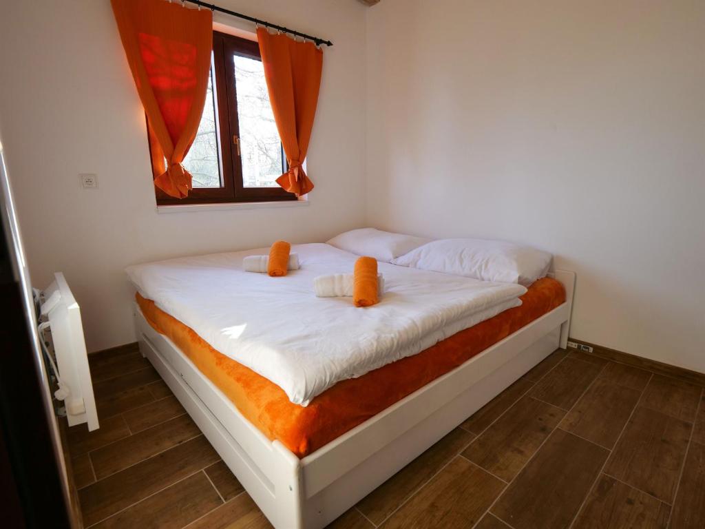Postel nebo postele na pokoji v ubytování Apartmány 13 Chata