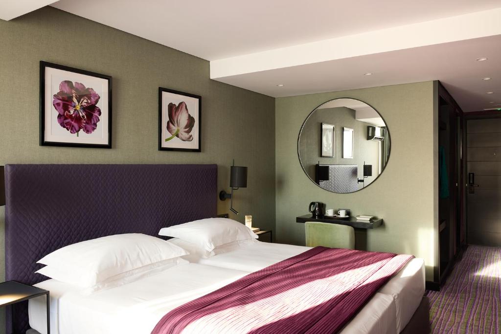 Postel nebo postele na pokoji v ubytování President Hotel Athens