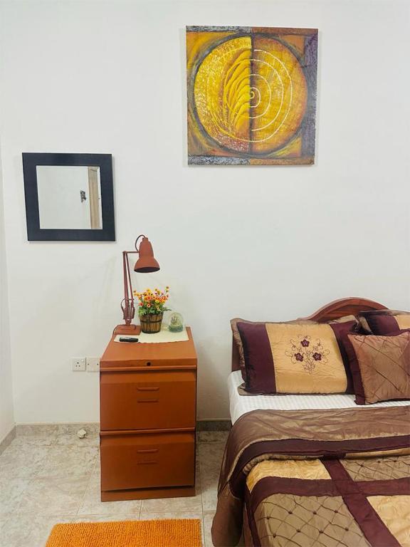 Postel nebo postele na pokoji v ubytování Sea Breeze Guest House Negombo