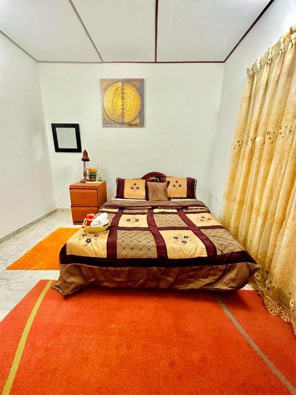 Postel nebo postele na pokoji v ubytování Sea Breeze Guest House Negombo