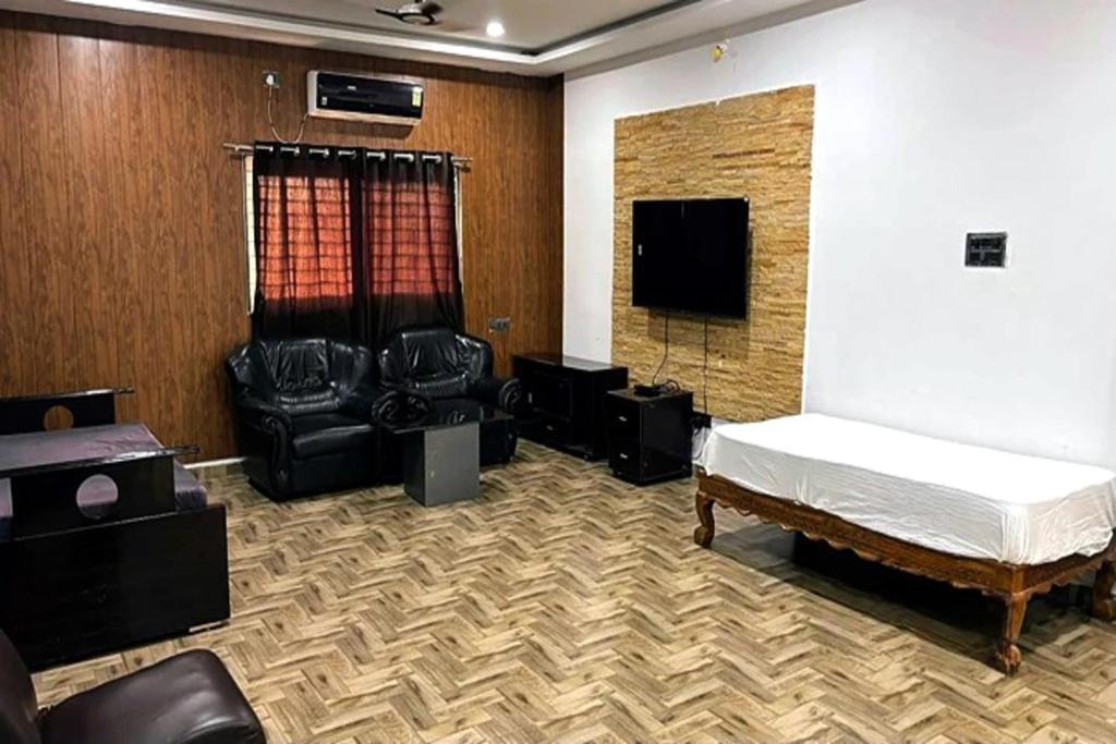 TV a/nebo společenská místnost v ubytování Stone Yard Resort