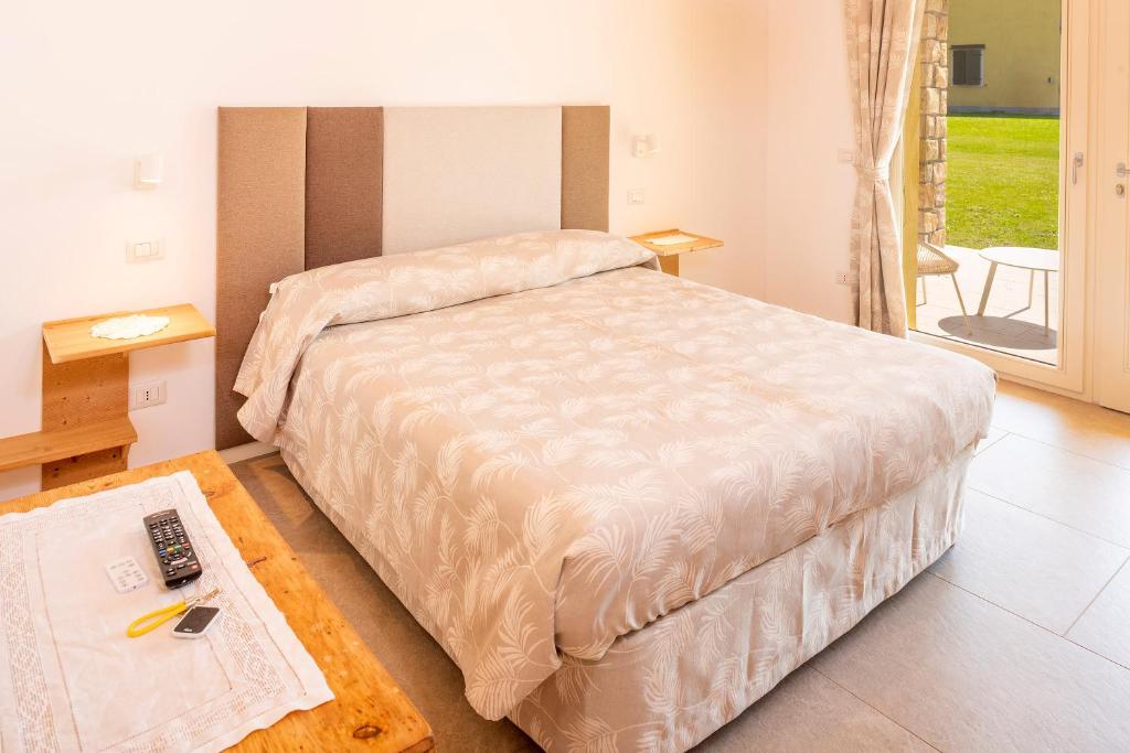 Postel nebo postele na pokoji v ubytování Azienda Agricola Rovertondo