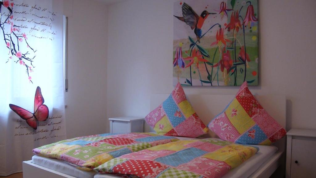 Postel nebo postele na pokoji v ubytování Ferienwohnung Moselsteig