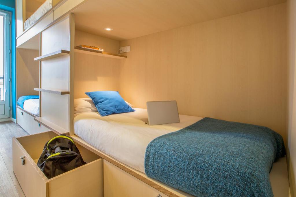Cama o camas de una habitación en Mola Hostel