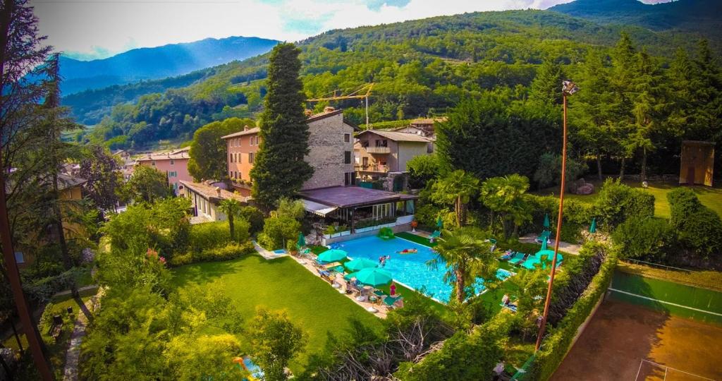 an aerial view of a resort with a swimming pool at Residence Concaverde in Pomarolo