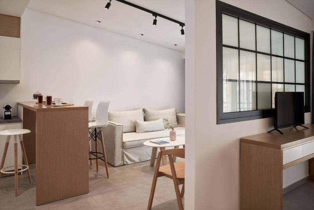 TV a/nebo společenská místnost v ubytování Cozy Suites Potos