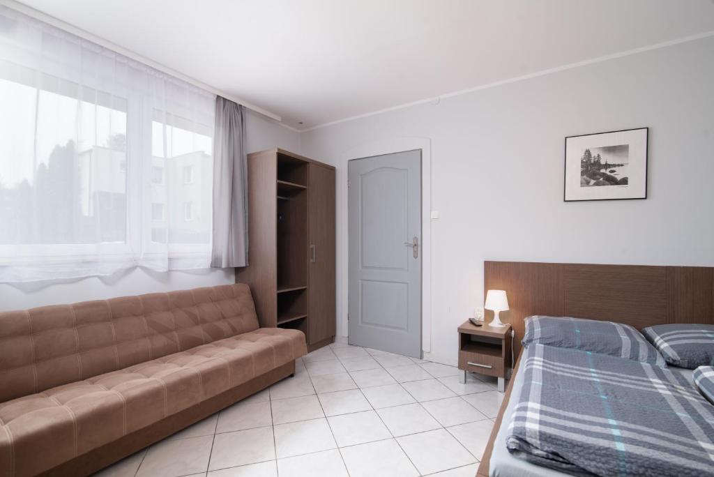 Cama o camas de una habitación en Super Pokoje Tom