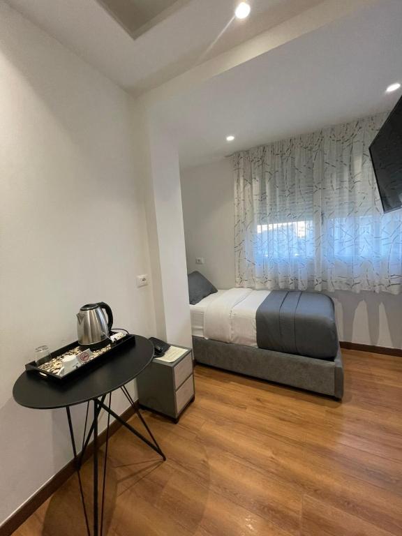 Postel nebo postele na pokoji v ubytování Peaky Hotel