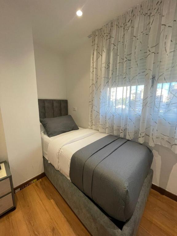 Postel nebo postele na pokoji v ubytování Peaky Hotel
