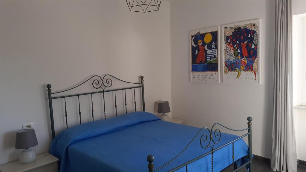 Postel nebo postele na pokoji v ubytování Casa Chiocconi