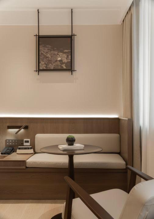 Posezení v ubytování Walling Hotel - Chongqing hongyadong jialingjiang binjianglu