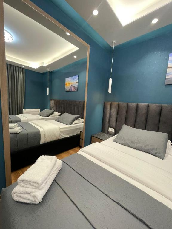 Postel nebo postele na pokoji v ubytování Peaky Hotel