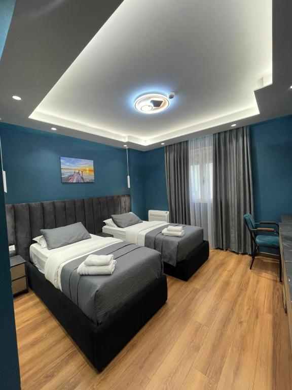 Postel nebo postele na pokoji v ubytování Peaky Hotel